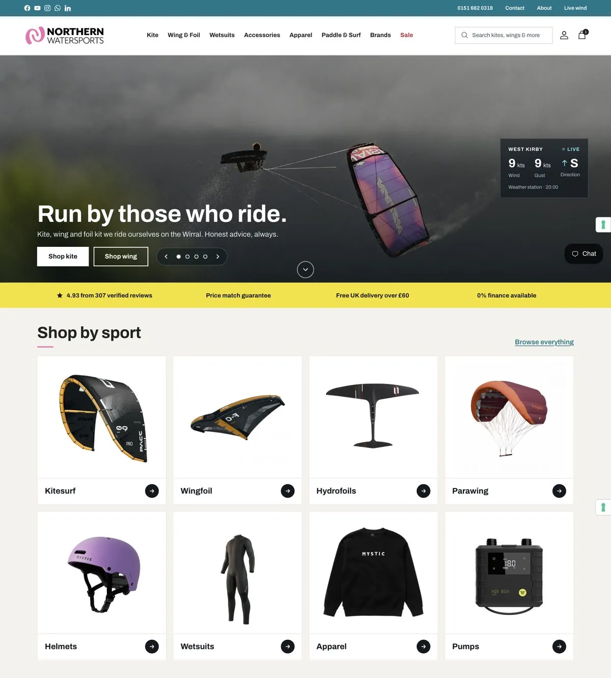 Northern Watersports homepage with a kitesurfer mid-air and a live West Kirby wind panel